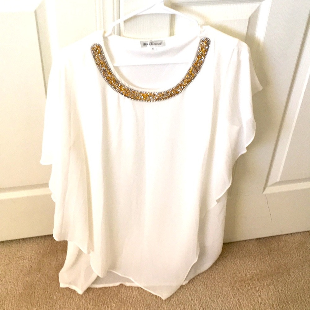 New Channel cream blouse